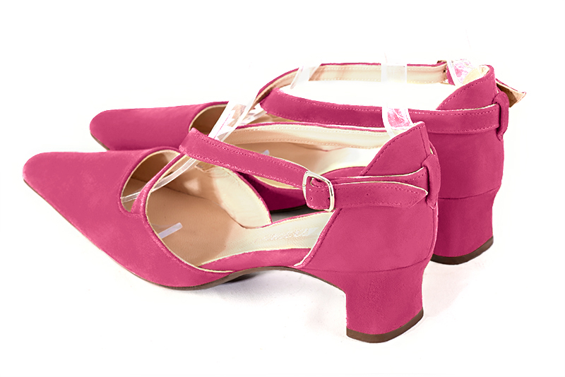 Fuschia pink women's open side shoes, with crossed straps. Tapered toe. Low kitten heels. Rear view - Florence KOOIJMAN